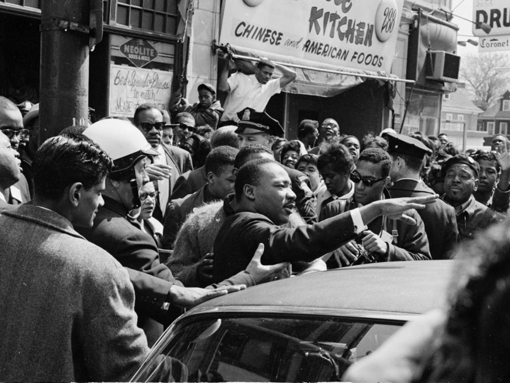 Martin Luther King Jr. leads a civil rights march to Boston Common in Massachusetts in 1965.<em> </em>