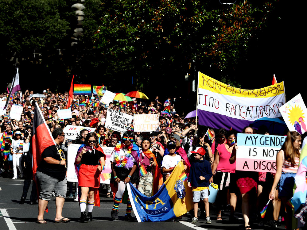 People march up Queen Street in Auckland, New Zealand, during the annual Pride Festival in February 2019. Three years later, lawmakers banned conversion practices by a near-unanimous vote.