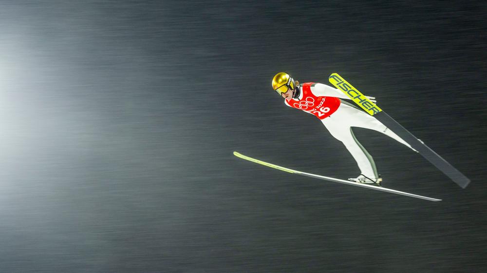 Norway's Robert Johansson soars through heavy snow fall during the Ski Jumping Men's Large Hill official training on February 13, 2022 during the Beijing 2022 Winter Olympic Games.