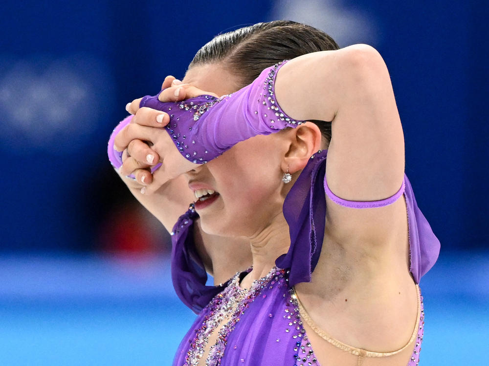 Russia's Kamila Valieva reacts after competing in the women's single skating short program at the Beijing 2022 Winter Olympic Games.