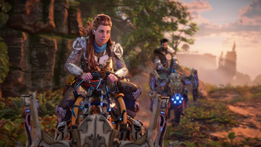 Aloy rides ahead of her ally, Varl, on conquered machines.
