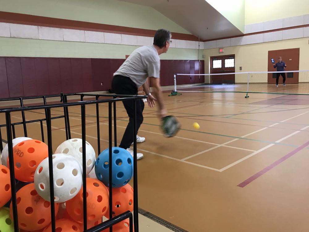 Gary Muscanell is among the lucky pickleball players in Meredith, N.H. There is a waiting list for the town's pickleball program.