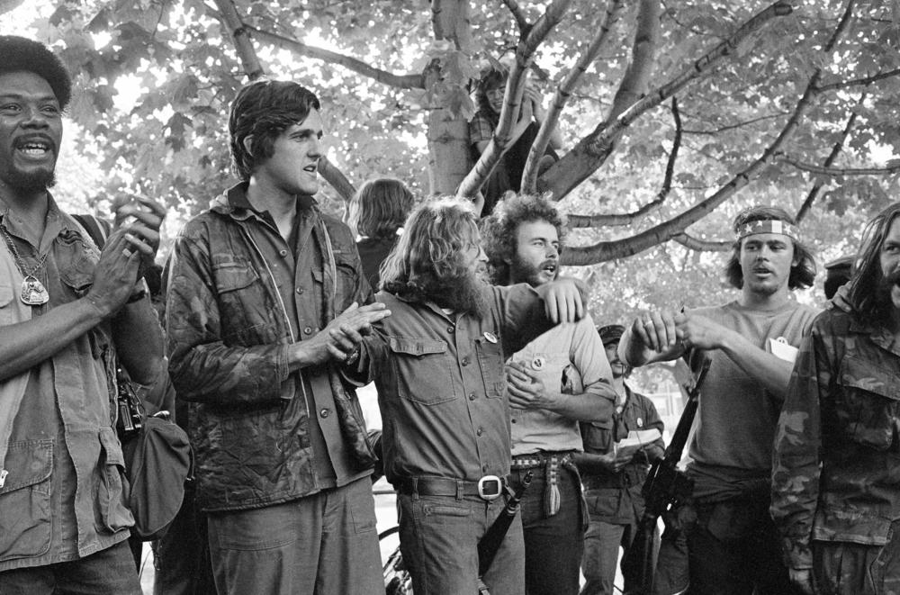John Kerry (second from left), a future U.S. senator and secretary of state, attends a Vietnam Veterans Against the War rally on Lexington Green during a protest march from Concord, Mass., to Boston, Memorial Day weekend, May 1971.