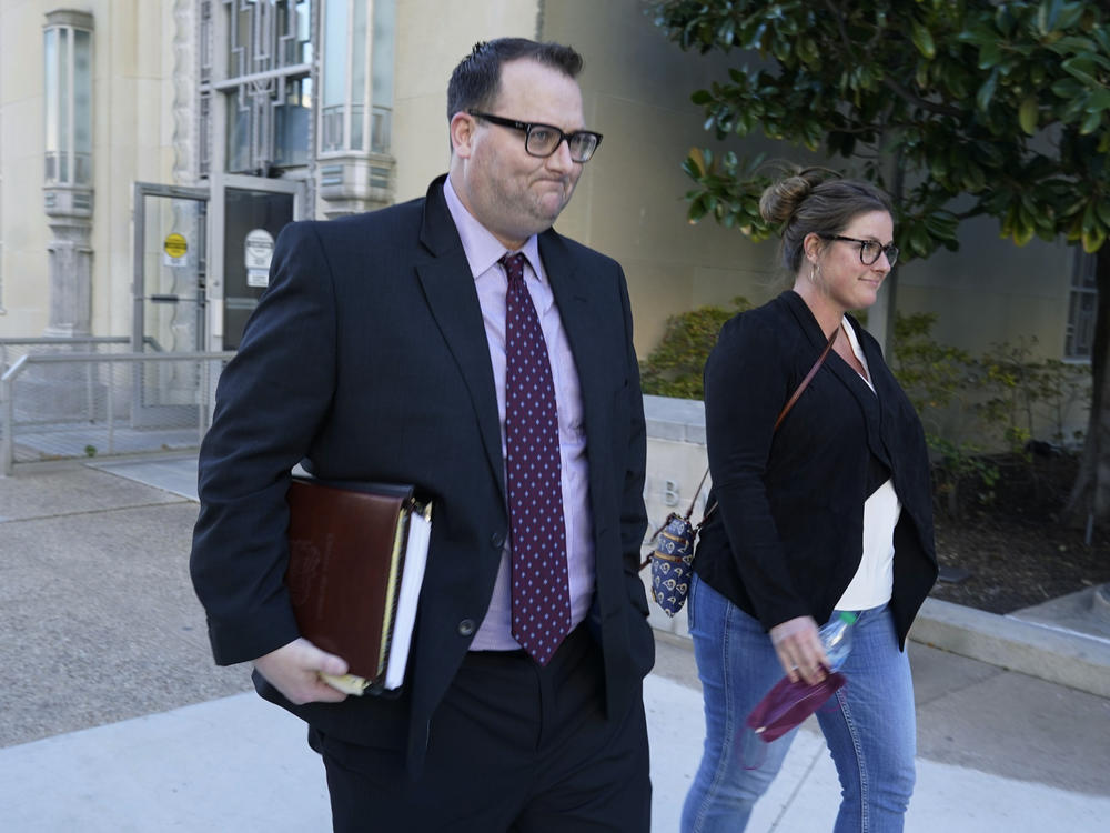 Former Los Angeles Angels employee Eric Kay, left, walks out of a federal court building on Tuesday during his trial on federal drug distribution and conspiracy charges. Kay was convicted Thursday of providing Angels pitcher Tyler Skaggs the drugs that led to his overdose death.