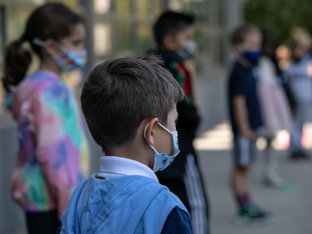 The White House says it is planning to distribute masks for children. The announcement comes as many states have been dropping mask requirements for schoolchildren.