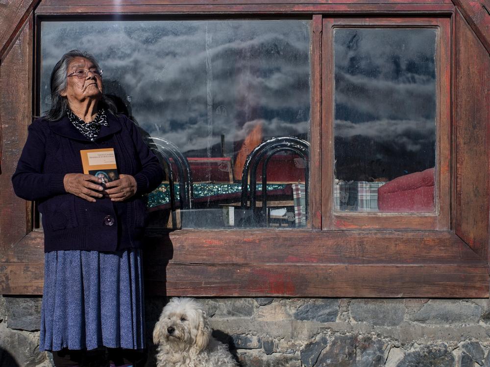 Cristina Calderón, the last known native speaker of the Yaghan language, poses outside of the local community center in Puerto Williams, southern Chile, on April 23, 2017.