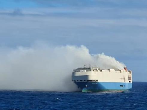 In this image posted on the Portuguese navy's website, the Felicity Ace is shown burning on Thursday in the Atlantic Ocean about 90 nautical miles southwest of the island of Faial in the Azores.