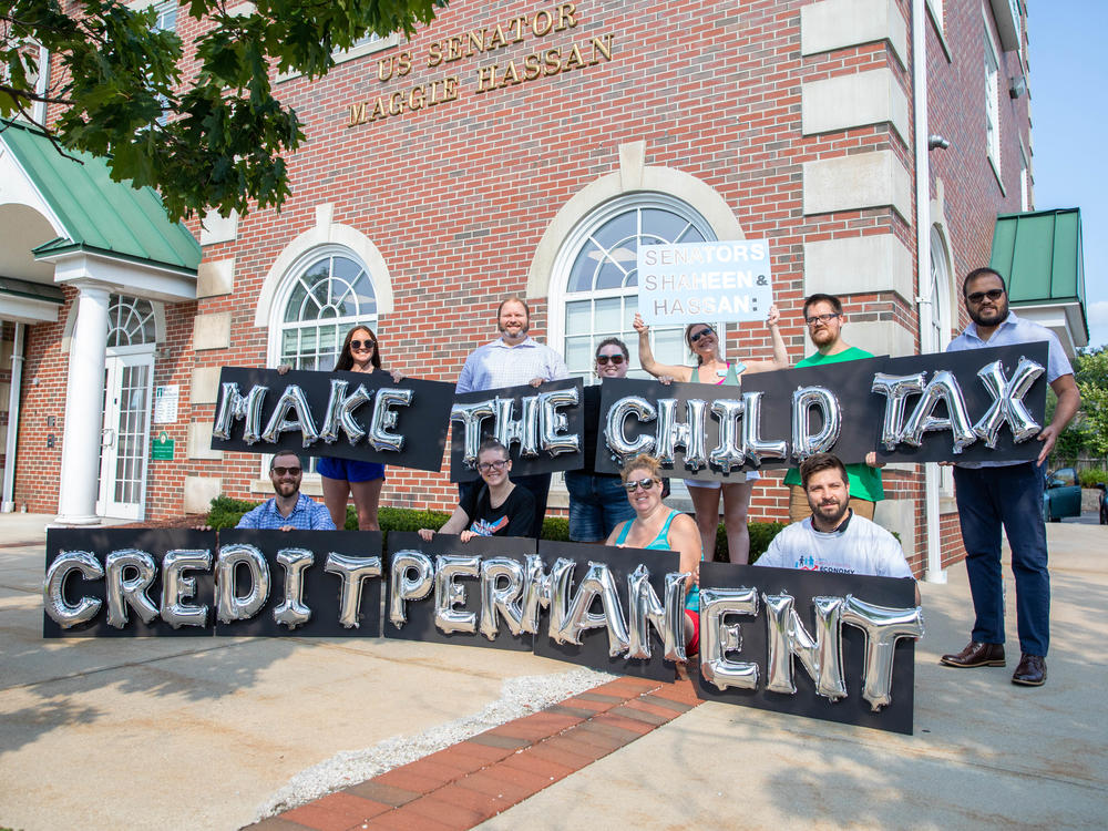 New Hampshire parents and other supporters gathered in September 2021 to push for making monthly child tax credit payments permanent.