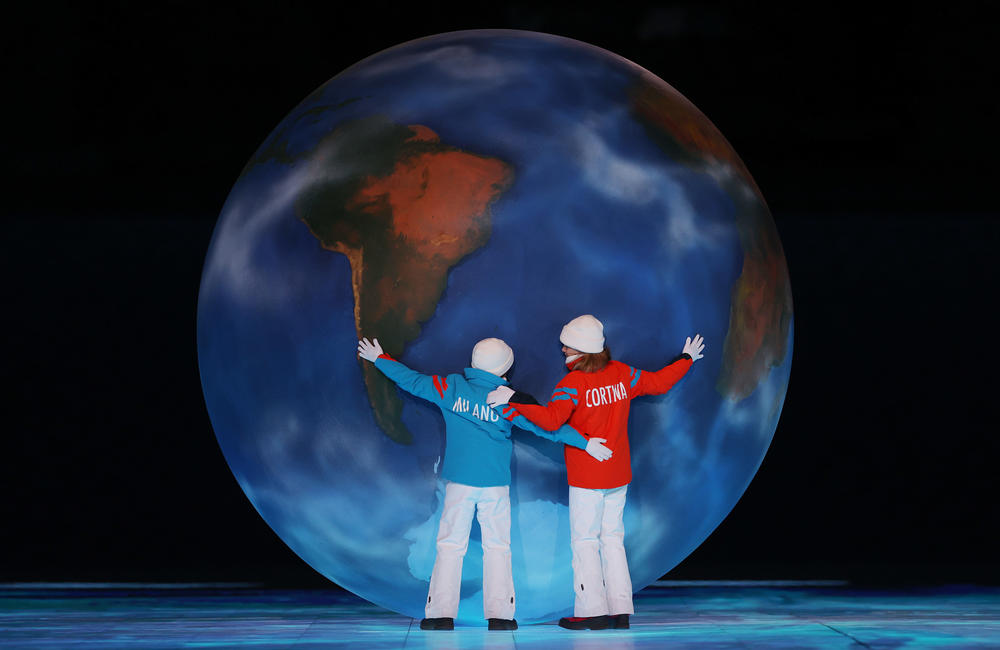 Children representing Milan and Cortina hold a globe as part of the handover ceremony during the Beijing 2022 Winter Olympics Closing Ceremony on Day 16 of the Beijing 2022 Winter Olympics at Beijing National Stadium on February 20, 2022 in Beijing, China.