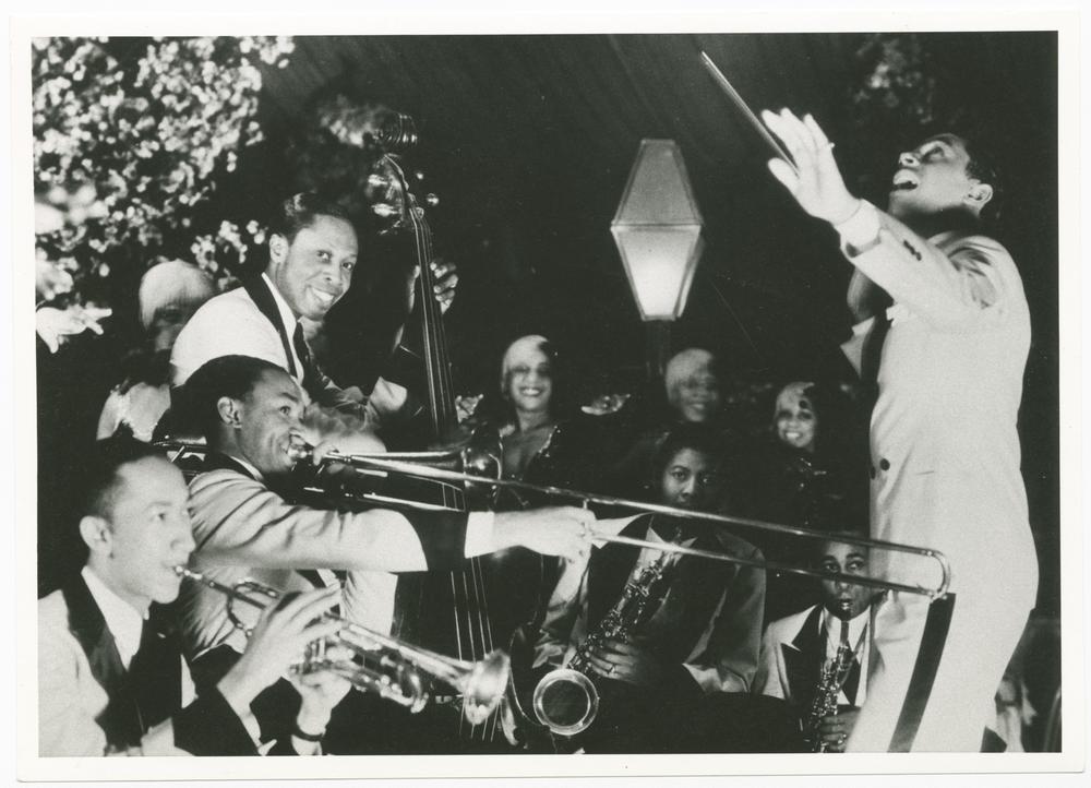 Cab Calloway conducts his band in the 1930s.