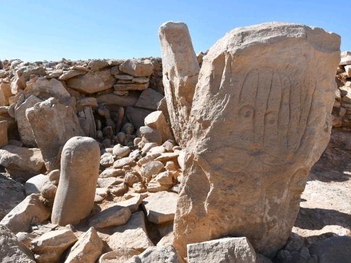 This photo shows two carved standing stones at a remote Neolithic site in Jordan's eastern desert. A team of Jordanian and French archaeologists said Tuesday that it had found a roughly 9,000-year-old shrine.