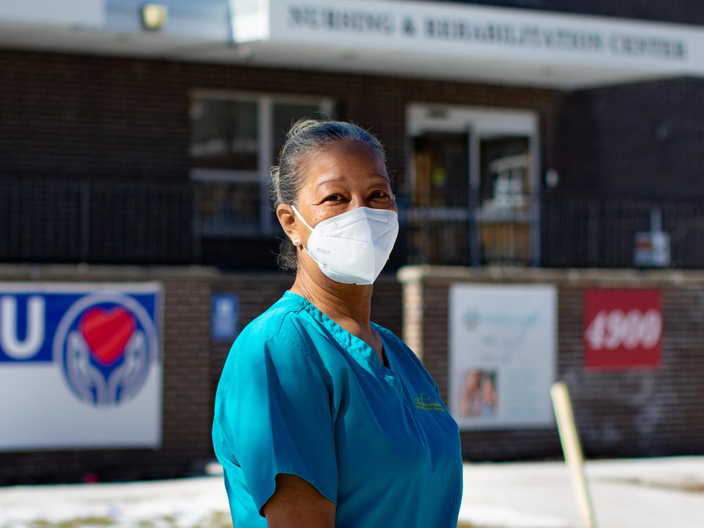 Nurse's aide Patricia Johnson has worked for the Ambassador Nursing and Rehabilitation Center on the north side of Chicago for nearly 24 years. The pandemic has been grueling on her and her colleagues. 