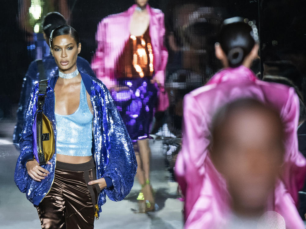 Models walk the runway at the Tom Ford spring/summer 2022 fashion show at Lincoln Center during New York Fashion Week on Sunday, Sept. 12, 2021.
