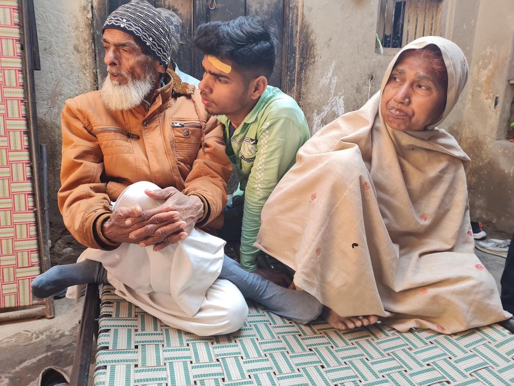 Mohammad Ayan, Faisal Husain's brother, sits between parents Islam Husain and Naseema Bano. Ayan wants to study law. 