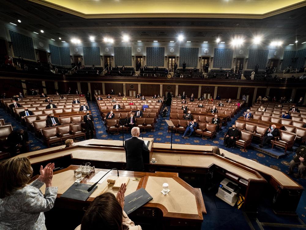 President Biden's State of the Union speech Tuesday will be his first since becoming president. But in April 2021, he addressed a joint session of Congress, with House Speaker Nancy Pelosi and Vice President Harris behind him on the dais.