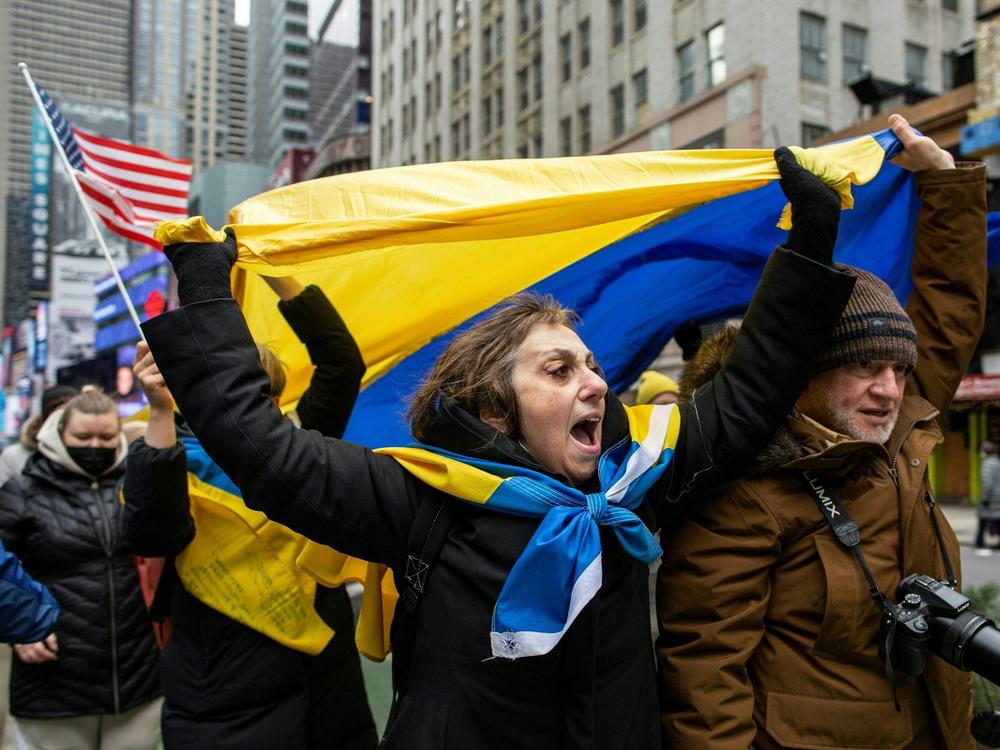 Demonstrators rally in New York City's Times Square in support of Ukraine on Thursday.