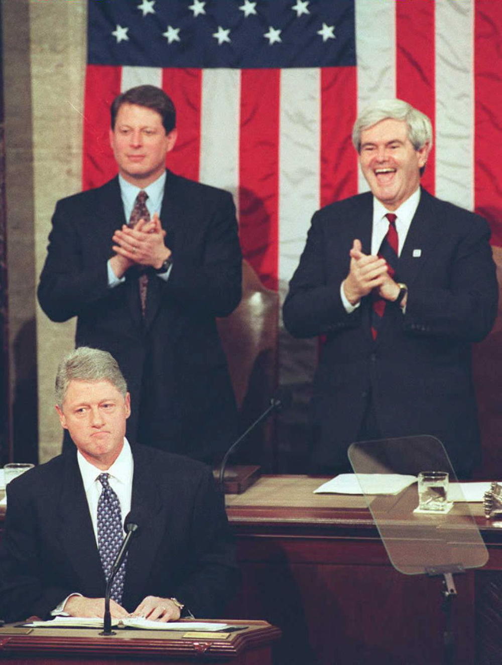 House Speaker Newt Gingrich (above right) laughs and applauds during President Bill Clinton's State of the Union address on Jan. 24, 1995. Republicans had just taken control of both chambers of Congress in November's midterm elections.