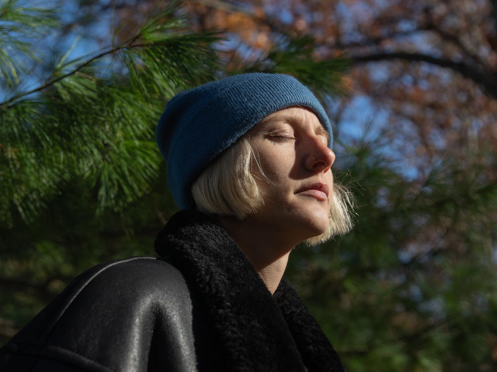 Hanna Wilt, pictured outside her home last November, died in February at age 27.