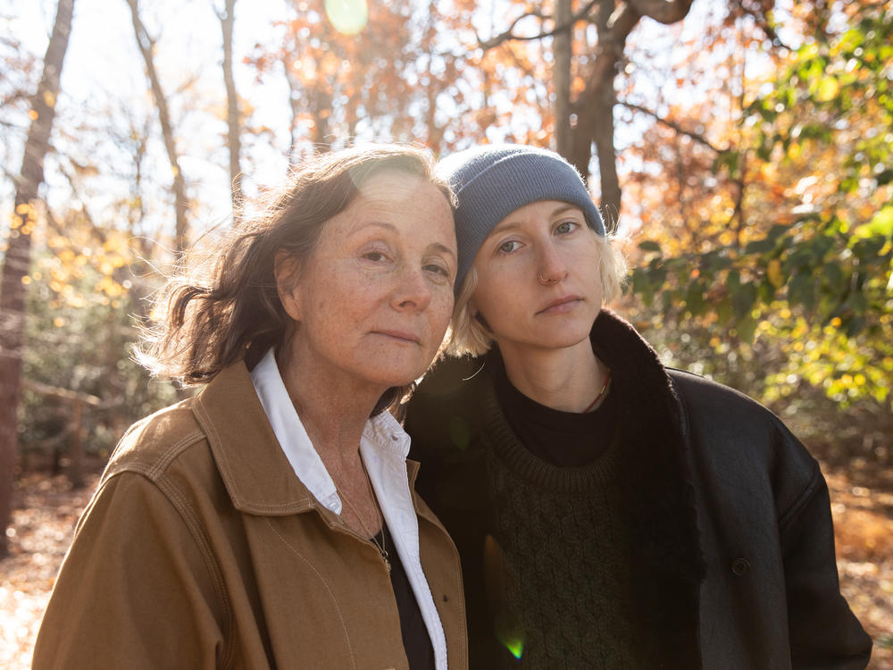Hope Schiller Wilt (left) and her daughter, Hanna Wilt, outside her home on Nov. 19, 2021, in Manasquan, N.J. The family plans to continue her lawsuit. 