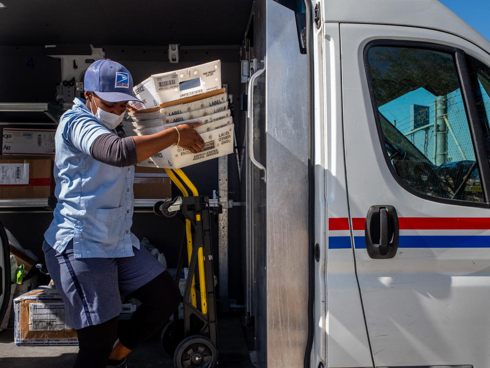 A US Postal service employee unloads mail at a facility on February 10, 2022 in Houston, Texas. On February 8, the House of Representatives passed the Postal Service Reform Act of 2022 (H.R. 3076). The legislation will address operational and financial issues that the agency has been grappling with for years.