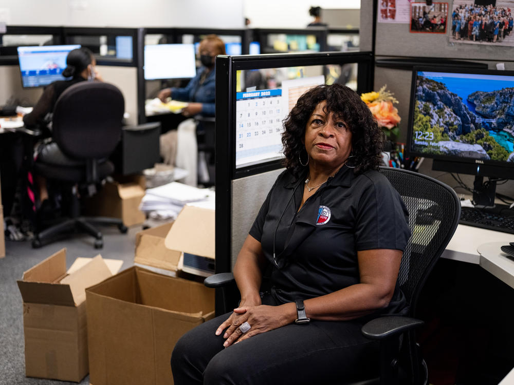 Nayda Arnold, the deputy director of voter services, says she spends a lot of time on the phone to make sure each voter feels comfortable.