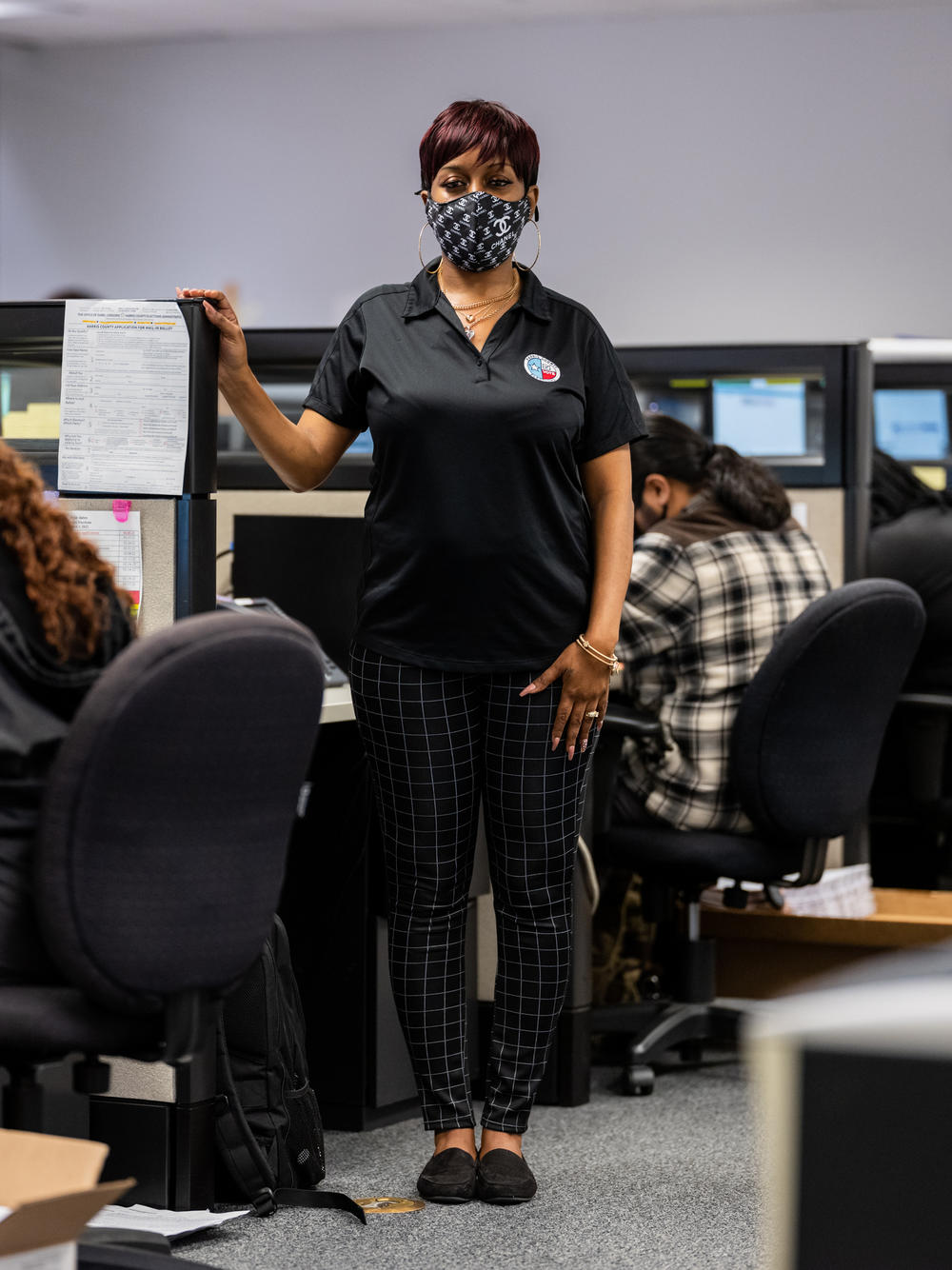 Call center clerk Angela Washington says concerned voters have been calling almost constantly, checking on their applications.