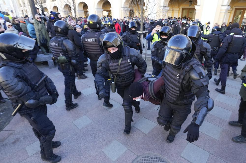 Police detain a demonstrator in St. Petersburg, Russia, on Sunday, during the third day of protests — and mass arrests — across the country against the invasion of Ukraine.