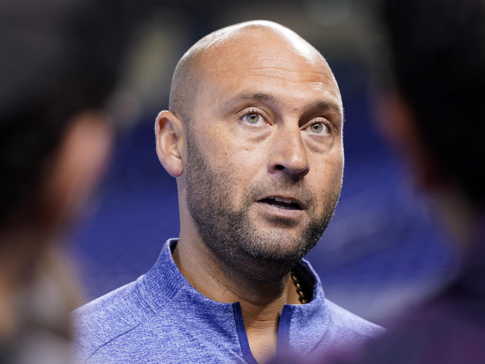 Derek Jeter, CEO of the Miami Marlins, speaks with the news media before a baseball game against the Philadelphia Phillies last year in Miami. Jeter announced a surprise departure from the Miami Marlins on Monday.