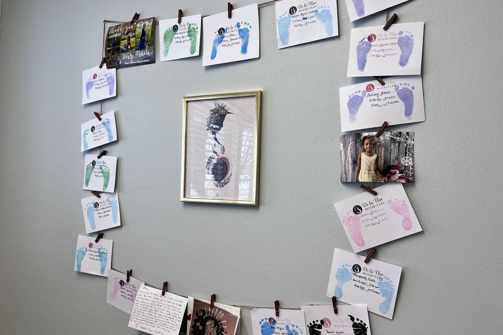 Baby's footprints decorate the wall at Tiffany Townsend's office.