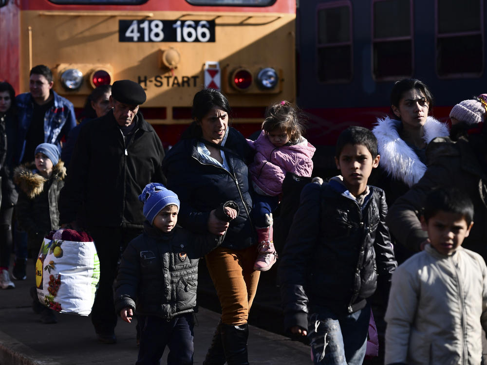 Refugees fleeing conflict from Ukraine arrive at Zahony, Hungary on Sunday.