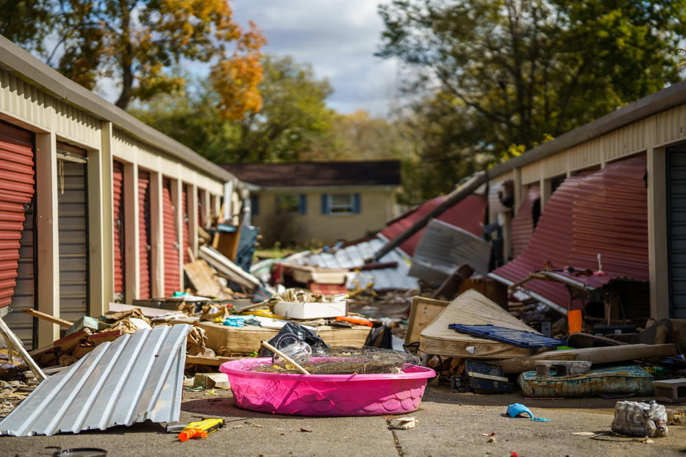 Contents of storage units displaced by flooding remain scattered across the grounds of a storage facility in Waverly, Tenn., days after devastating floods pounded the area.