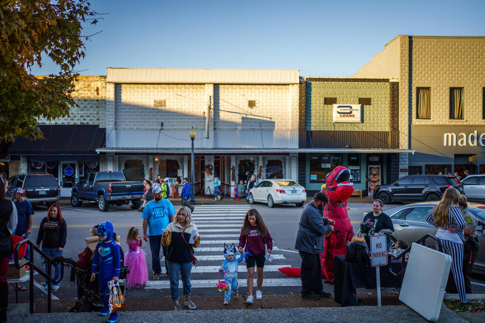 Trick-or-treating gets underway during a Halloween event in downtown Waverly, Tenn.