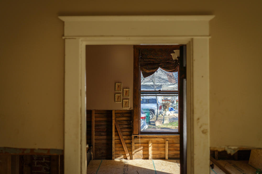 The Turners are in the process of installing new subfloors in their home due to flood damage.