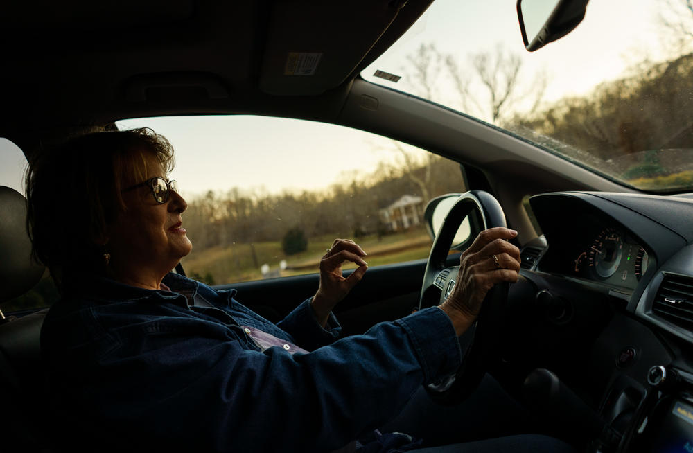 Gretchen drives through the outskirts of Waverly, Tenn., where homes weren't affected by the flood.