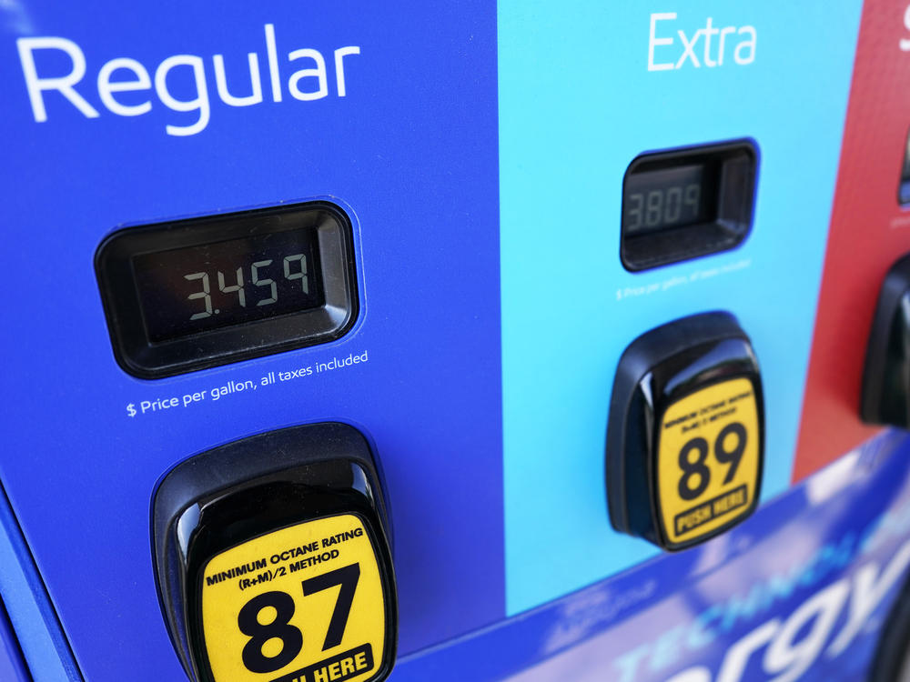 Gas prices are seen at a gas station in Vernon Hills, Ill., on June 11, 2021. Crude prices continued to gain on Thursday even after the U.S. and 30 other countries announced a coordinated release of oil from their reserves.