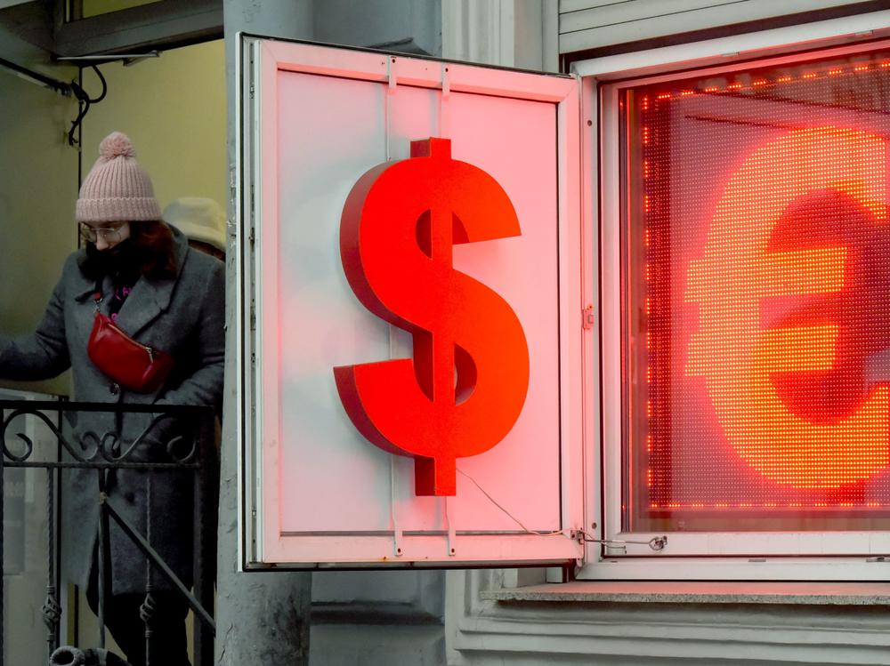 A woman leaves a currency exchange office in St. Petersburg, Russia, on March 2.