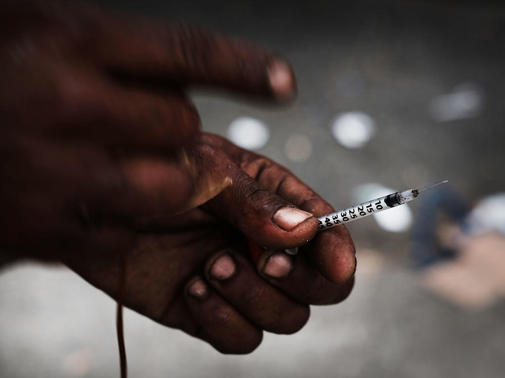 A heroin user in a South Bronx neighborhood which is experiencing an epidemic in drug use, especially heroin and other opioid based drugs.