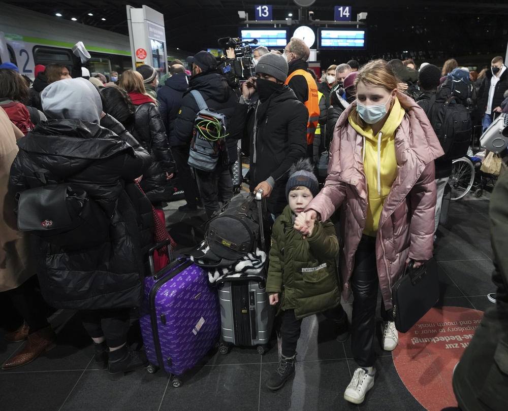 Ukrainians are turning up in Berlin's main train station, some of the more than 1 million estimated to have fled the Russian invasion in recent days.