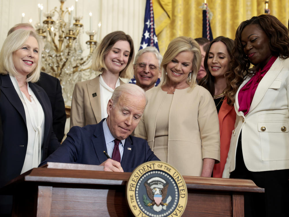 President Joe Biden signs the Ending Forced Arbitration of Sexual Assault and Sexual Harassment Act of 2021 into law on Thursday.