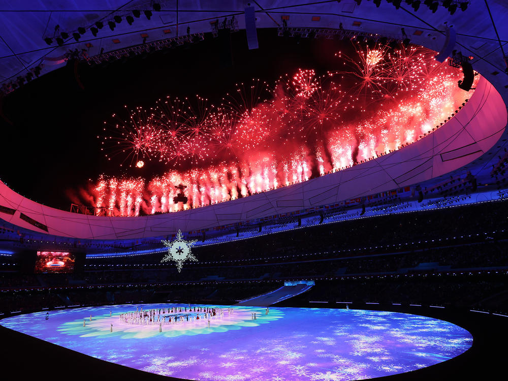 Fireworks are seen as the Olympic cauldron is lit during the Opening Ceremony of the Beijing 2022 Winter Paralympics at the Beijing National Stadium on March 04, 2022 in Beijing, China.
