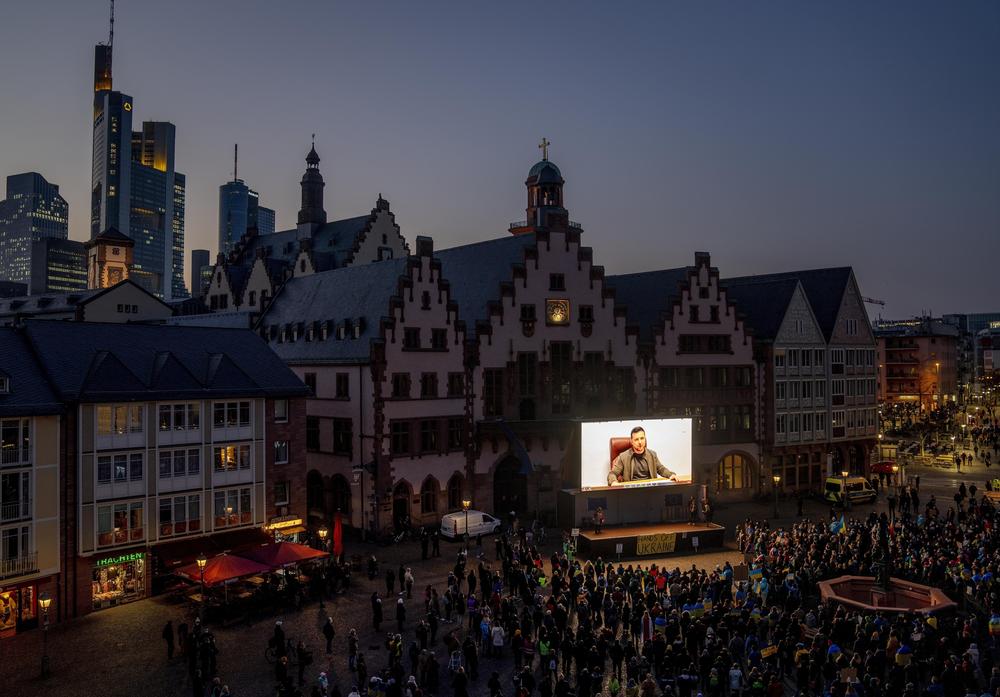 <strong>March 4:</strong> Ukrainian President Volodymyr Zelenskyy delivers a video message to the people gathered for a rally in Romerberg Square in Frankfurt, Germany.