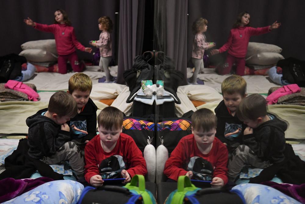 <strong>March 5:</strong> Children play inside a shelter for refugees at the Lviv Regional Academic Puppet Theatre in western Ukraine.