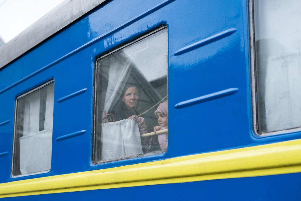 A family leaves for Poland while the father stays in Ukraine. Men between the ages of 18-60 are not permitted to leave Ukraine.