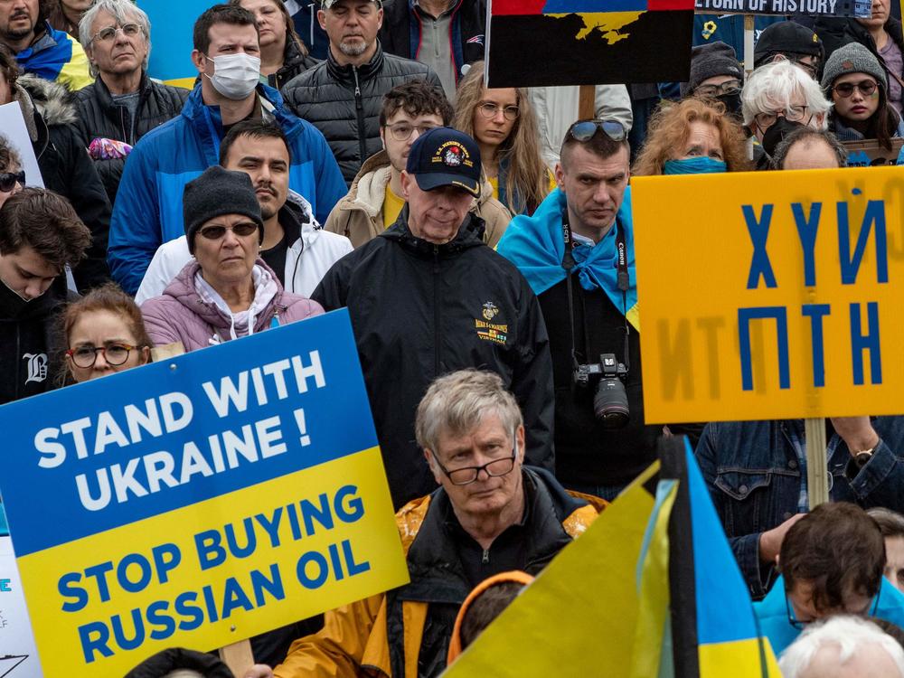 Protesters in Boston call for a ban on Russian oil at a rally for Ukraine on Sunday.