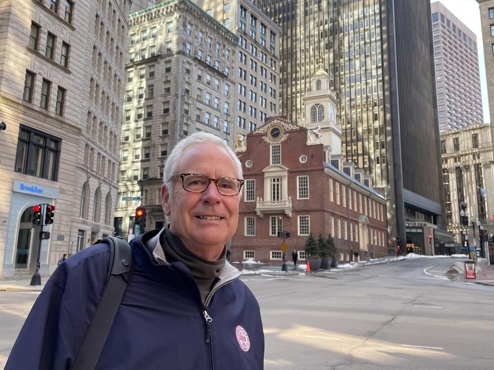 Andy Waugh , a managing director at a large insurance broker in Boston, heads out to catch his train home after a day in the office. He's encouraging more workers to return, saying it's important for training, employee advancement, and company culture.