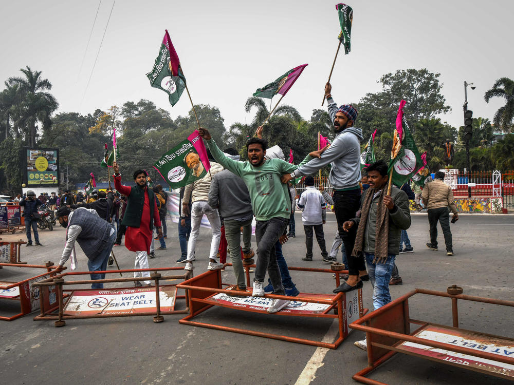 Activists from the All India Students Association and other groups protest in Patna during a statewide strike on Jan. 28 over the ramping up of qualifications for railway jobs.
