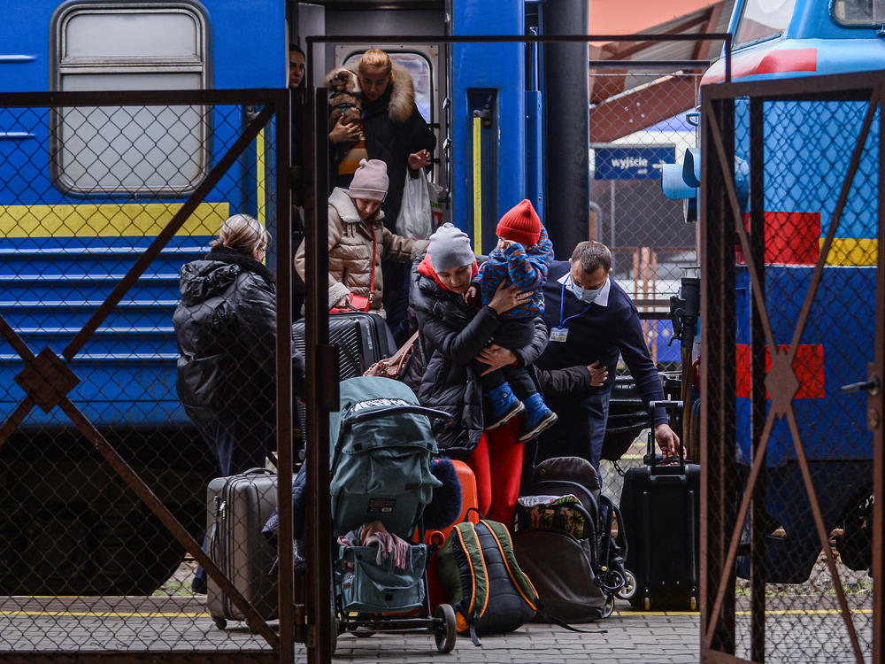 Millions have fled Ukraine, with many coming to Poland through Przemyśl's main train station.