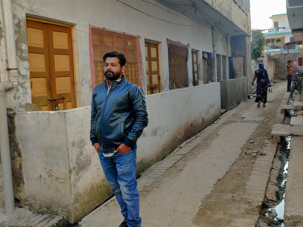 Sumit Guatam holds four degrees — but no job. He's part of a growing unemployment crisis in India. He stands in front of the house his parents had built in the city of Prayagraj. When he came there to study, they gave the house to him.