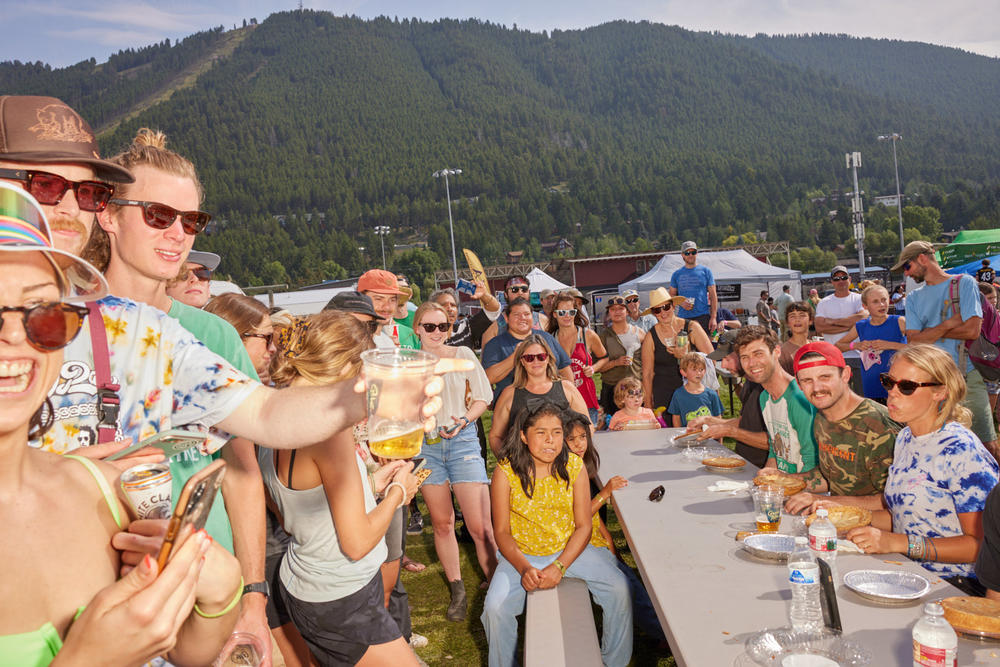 A crowd looks on during the Teton County Fair's pie-eating contest in Jackson, Wyo., on Aug. 1, 2021.