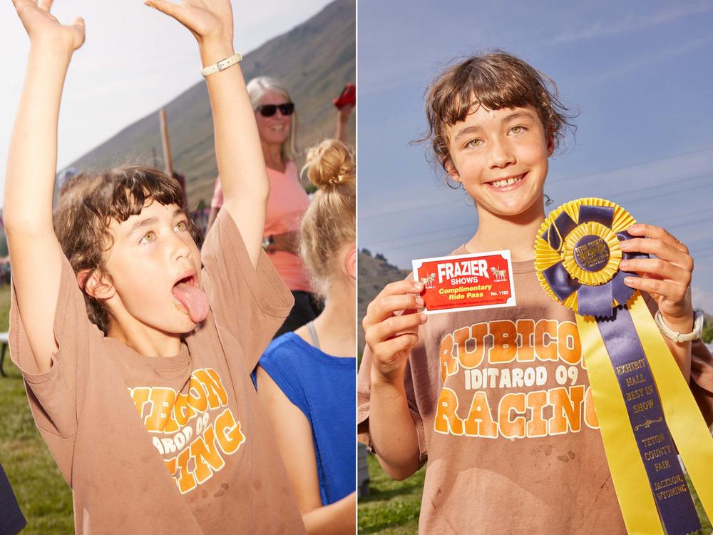 The winner of the Teton County Fair's pie-eating contest holds up her ribbon in Jackson, Wyo., on Aug. 1, 2021.